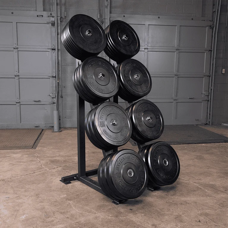 A variety of weight plates arranged on a rack