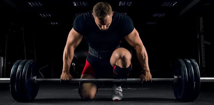 Powerlifter deadlifting a heavy weight