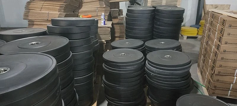 Industrial manufacturing process of weight plates in a factory