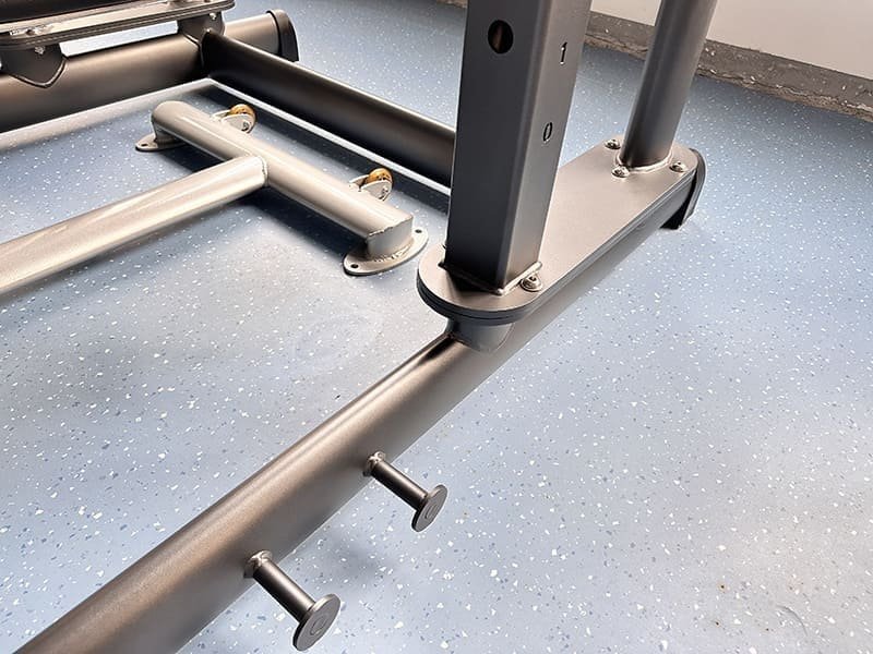 Close-up of a thick steel frame on a strength machin